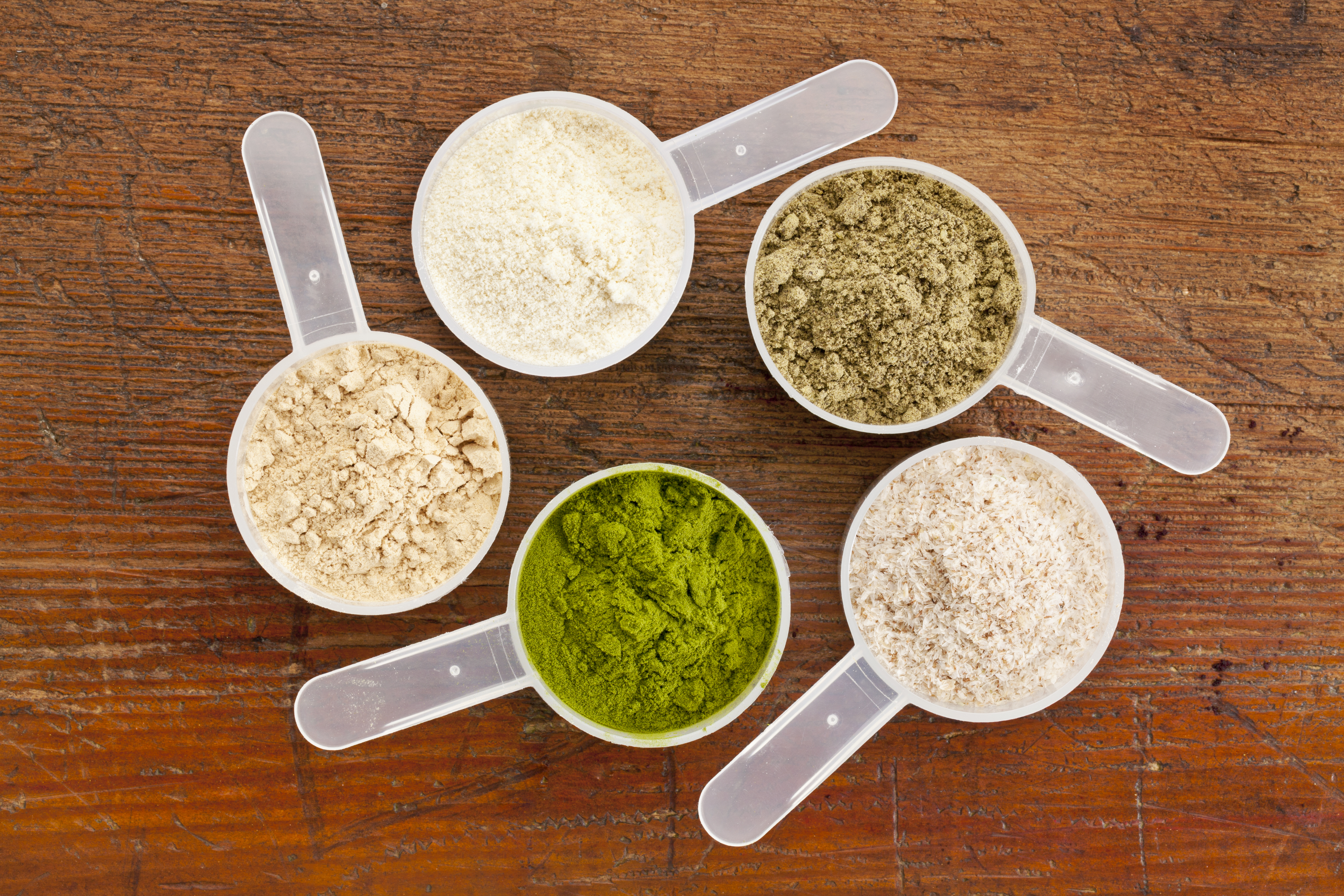 SCOOPS OF DIFFERENT POWDER PROTEIN